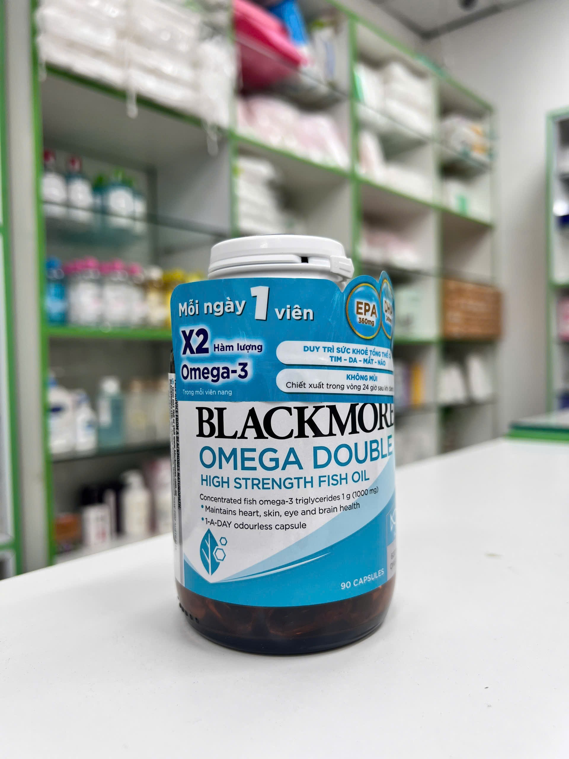 BLACKMORES OMEGA DOUBLE HIGH STRENGTH FISH OIL — chai 90 viên nang mềm với nhãn xanh trắng